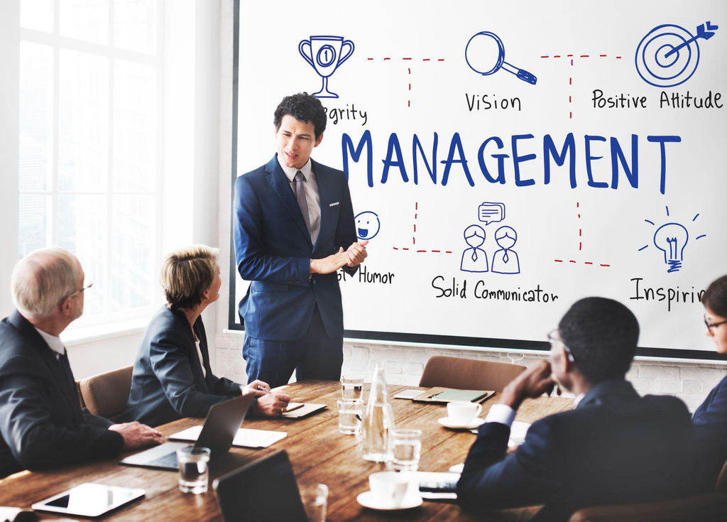 Business management training session with a manager presenting leadership qualities