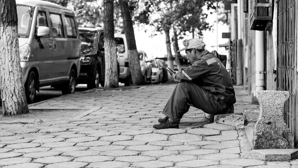 A teenager using a smartphone